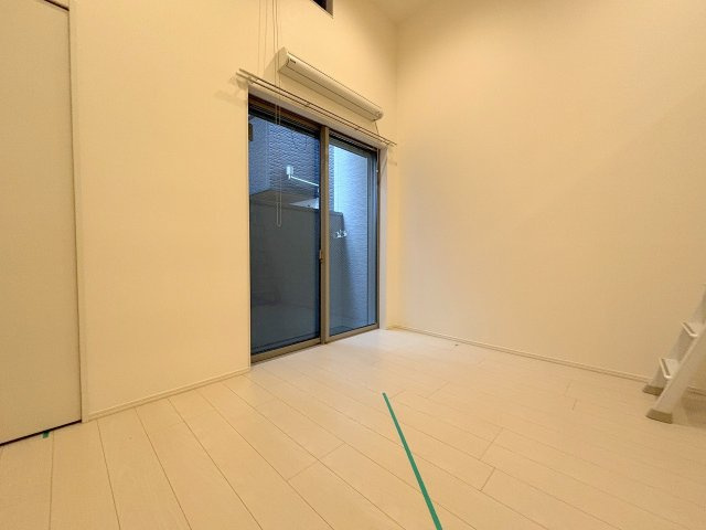 アクセル三津屋北の洋室