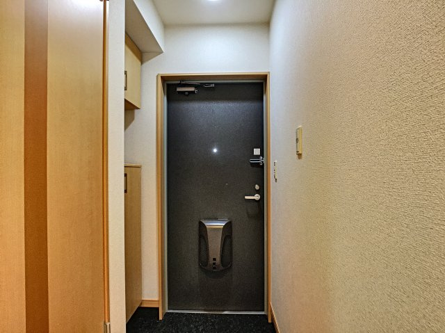 直方市大字頓野のアパートの玄関