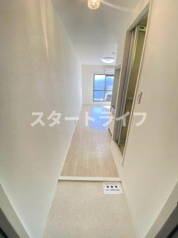 大阪市東淀川区淡路５丁目の賃貸マンションの玄関