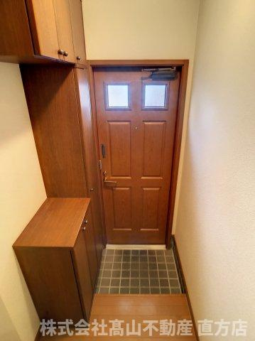 直方市大字頓野のアパートの玄関