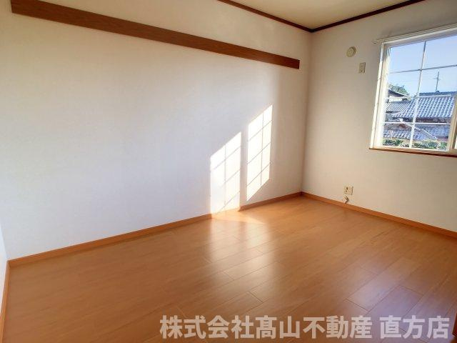 直方市大字頓野のアパートの寝室