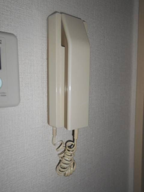 ハイツ創英の寝室