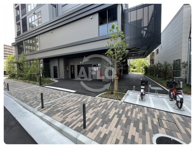 プラウドタワー梅田豊崎　豊崎小学校区の駐車場|プラウドタワー梅田豊崎　駐車場出入口