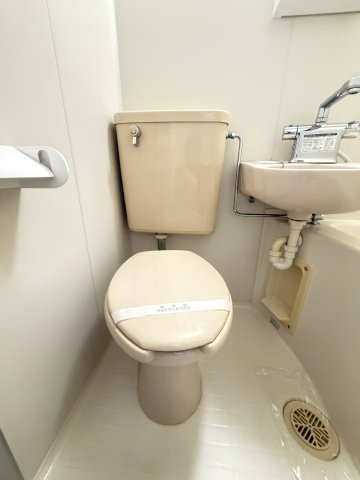 神戸市灘区篠原中町３丁目の賃貸マンションのトイレ