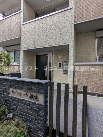 大阪市福島区吉野１丁目のアパートのエントランス