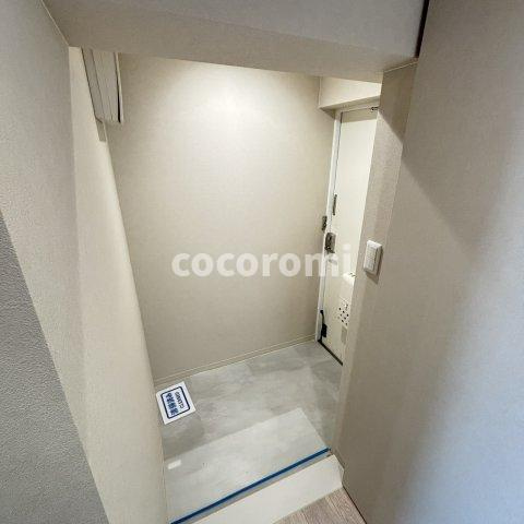 プログレッソ寝屋川の玄関