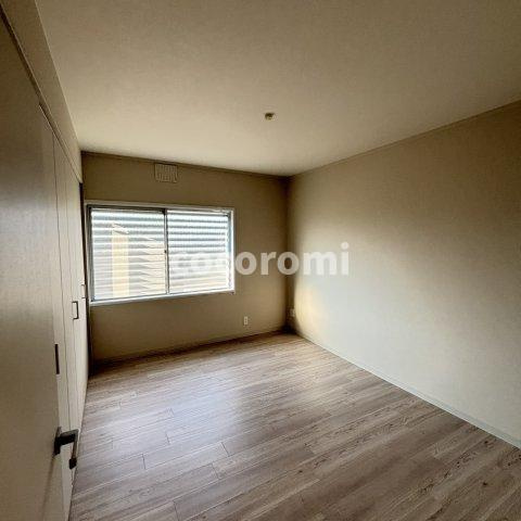プログレッソ寝屋川の洋室