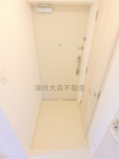 Augusta　Residence大森（オーガスタレジデンス）の玄関