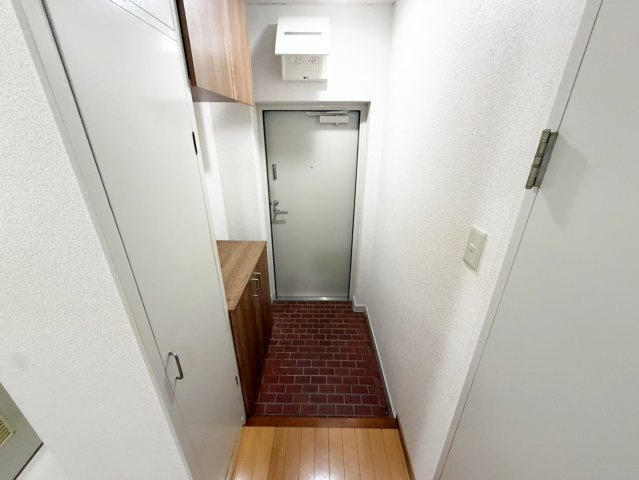 南千里OMパレスの玄関