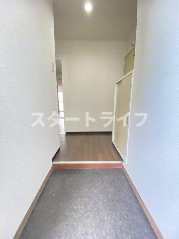 大阪市淀川区三国本町３丁目の賃貸マンションの玄関