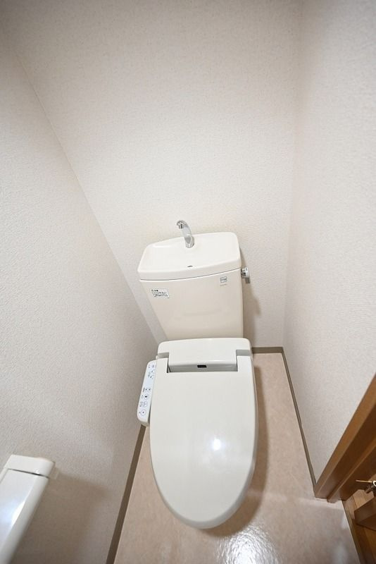 日野市新井２丁目の賃貸マンションのトイレ