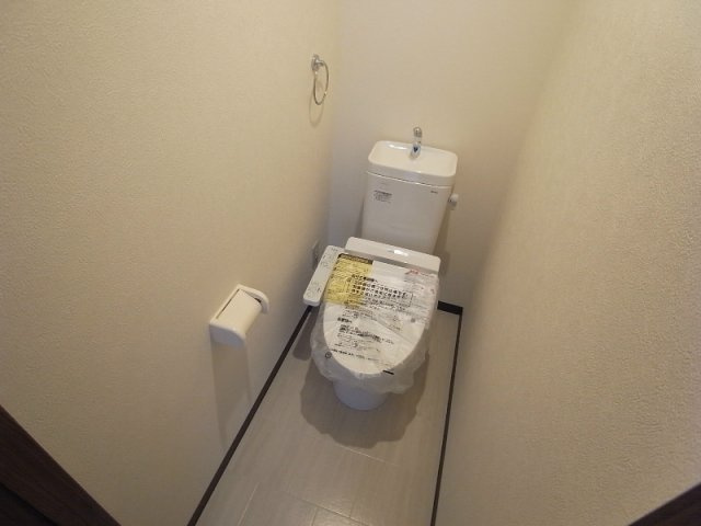 神戸市中央区生田町４丁目の賃貸マンションのトイレ