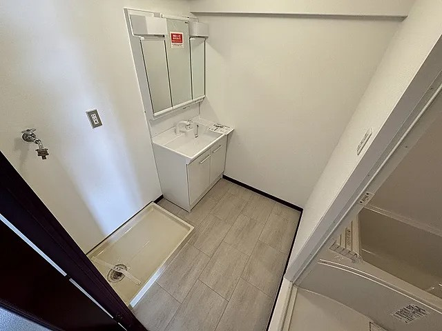 神戸市灘区城の下通３丁目の賃貸マンションの洗面所
