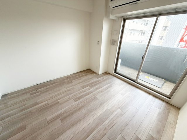 アルティザ江坂の寝室