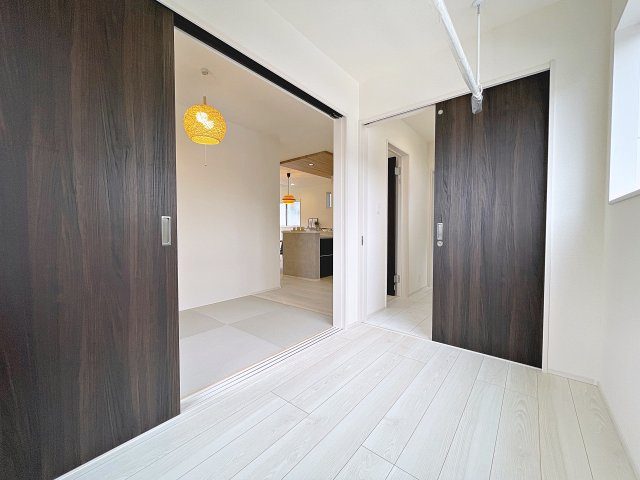 新築戸建・新築建売　伊達市篭田　伊達小学校・伊達中学校のランドリースペース|タタミスペース→ランドリースペース→洗面室と、回遊性が高く家事動線良好です！