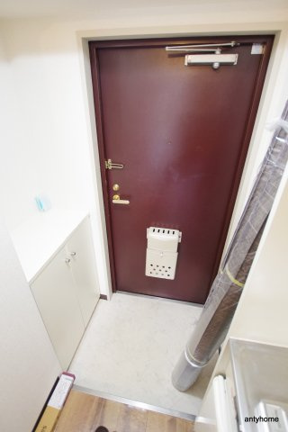 リアライズ西淡路　仲介手数料無料の玄関