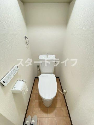 大阪市東淀川区西淡路４丁目の賃貸マンションのトイレ