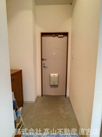 直方市大字頓野のアパートの玄関