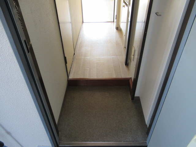 カーサ王塚台の玄関