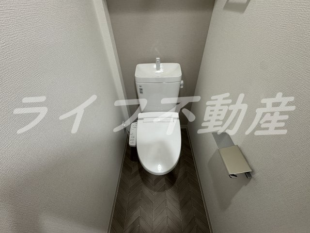 アドバンス大阪メルディアのトイレ|落ち着いた色調のトイレです