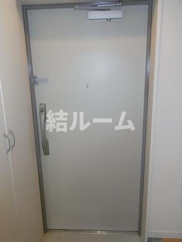 北区中里３丁目の賃貸マンションの玄関