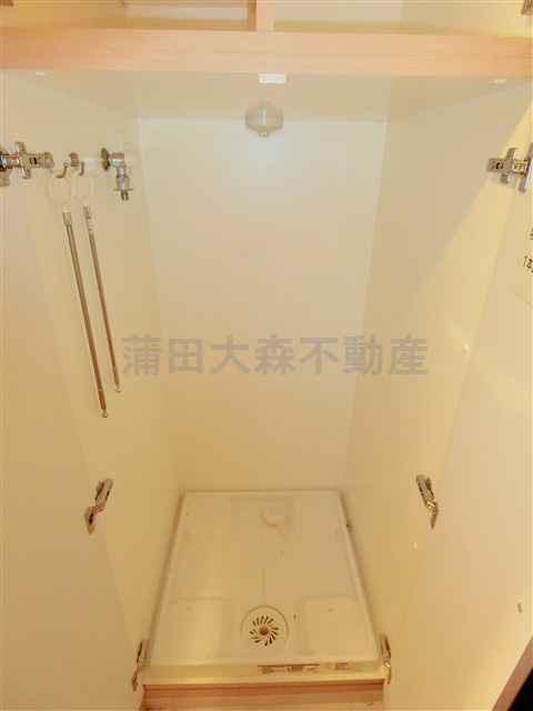 ルーブル仲六郷弐番館の設備|洗濯機置き場