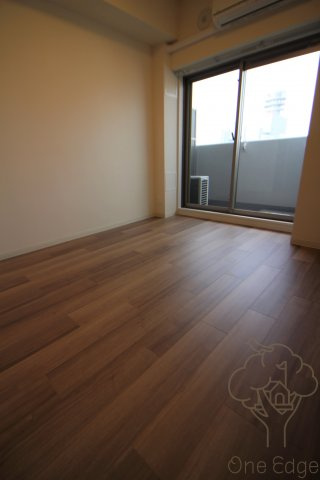 プレサンス扇町駅前の寝室
