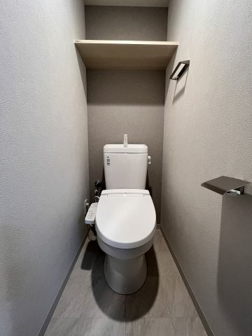 大阪市西区西本町２丁目の賃貸マンションのトイレ
