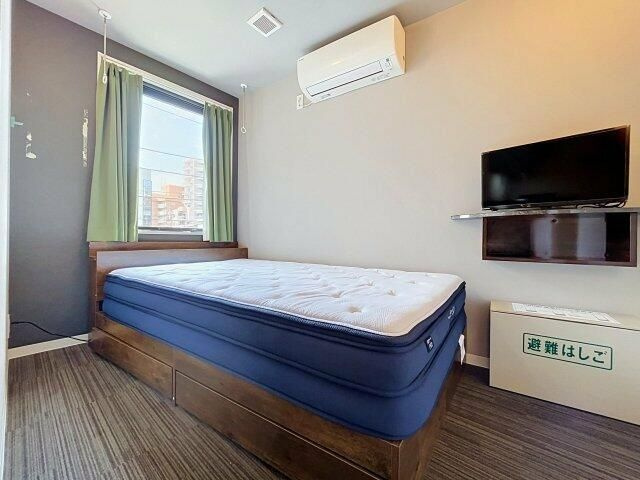 Ａｐａｒｔｍｅｎｔ小石川後楽園の居間・リビング