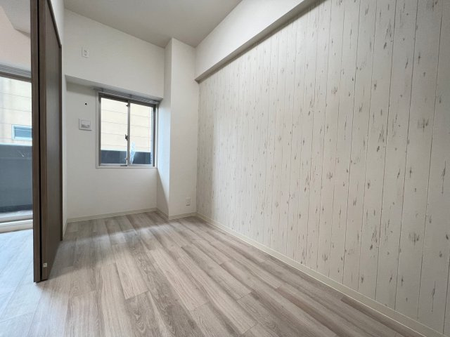 プレサンス　DOMECITY　コレーレの洋室