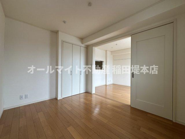 川崎市麻生区栗平２丁目のアパートの寝室