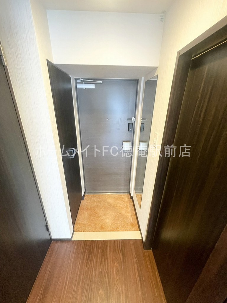 大阪市城東区今福南３丁目の賃貸マンションの玄関