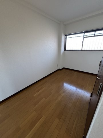 四條畷サカモトマンションの洋室
