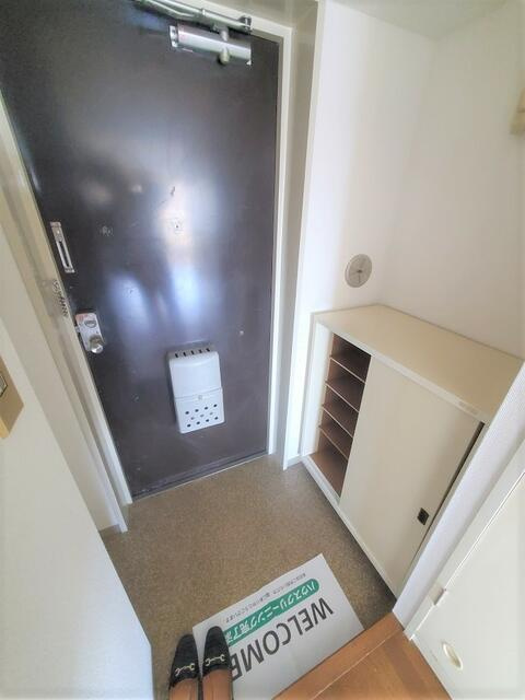 稲城市矢野口の賃貸マンションの玄関