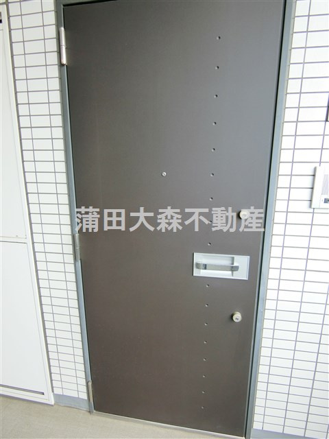 ライジングプレイス蒲田南の玄関