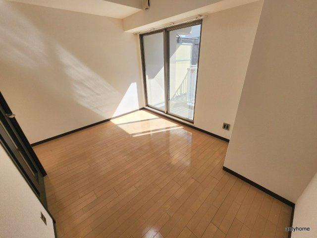 レジュールアッシュ谷町の洋室