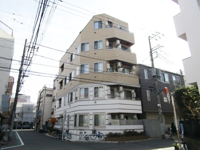 ロイヤルシティ西日暮里の外観|ツートンカラーのおしゃれな外観です。
