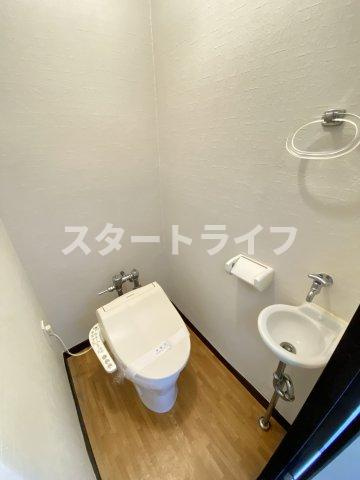 大阪市淀川区木川東４丁目の賃貸マンションのトイレ