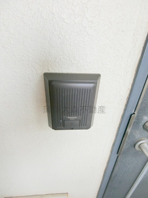 グランドステータス西糀谷の玄関