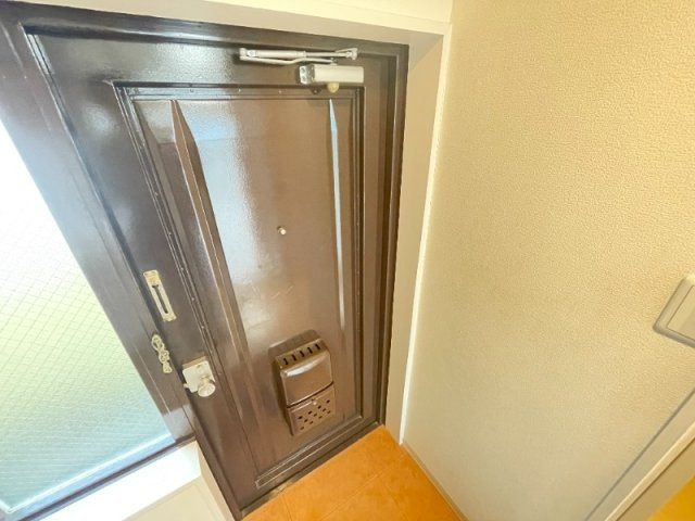 神戸市東灘区本山北町６丁目の賃貸マンションの玄関