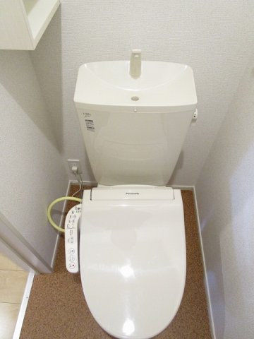 サンエスコートのトイレ|落ち着いた色調のトイレです