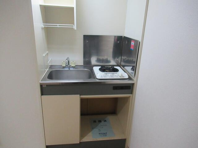 川田ビルのキッチン|別号室の写真を使用しておりま…