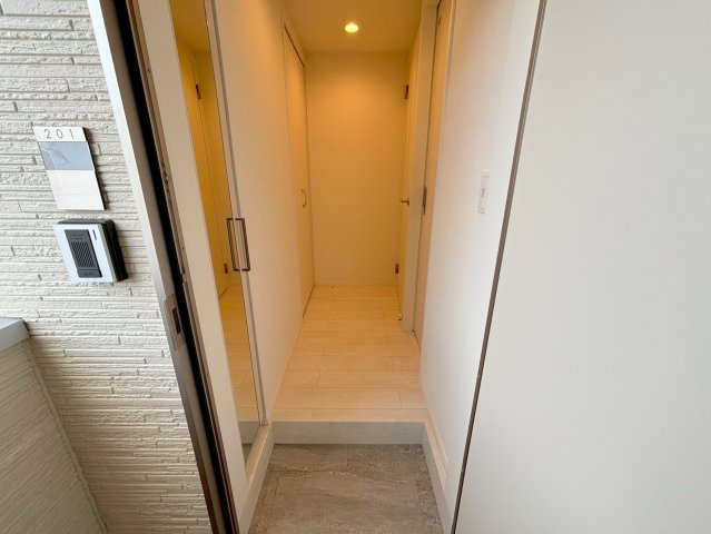 ハーモニーテラス三津屋南の玄関