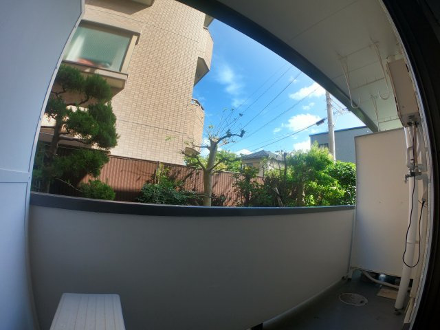 人目に付きにくい屋外洗濯機置き場