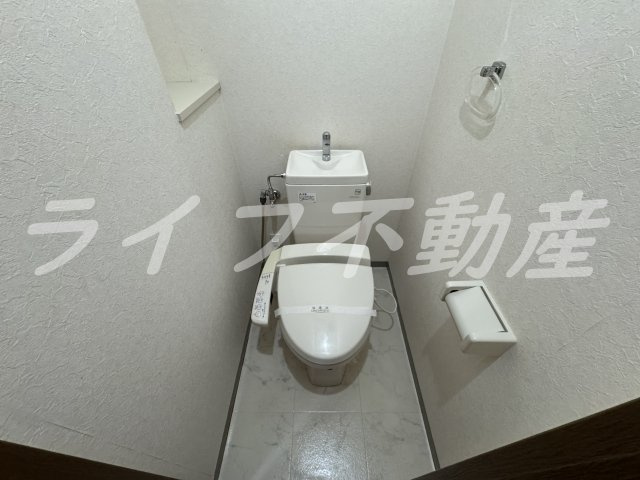 クレール玉造のトイレ|落ち着いた色調のトイレです