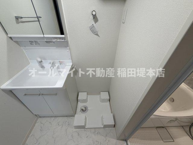 稲城市坂浜のアパートの洗面所