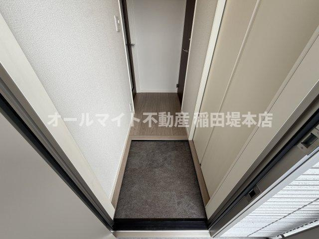 稲城市坂浜のアパートの玄関