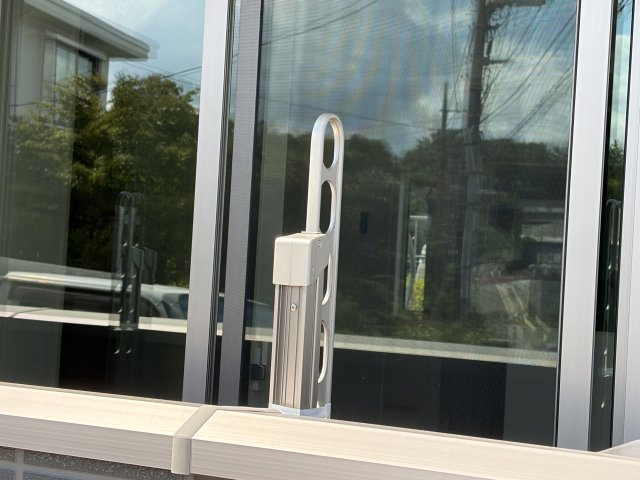 稲城市坂浜のアパートのエントランス