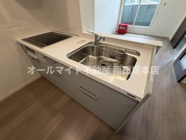 稲城市坂浜のアパートのキッチン