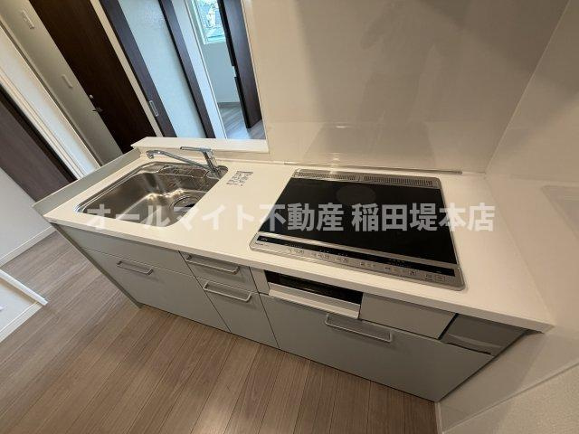 稲城市坂浜のアパートのキッチン